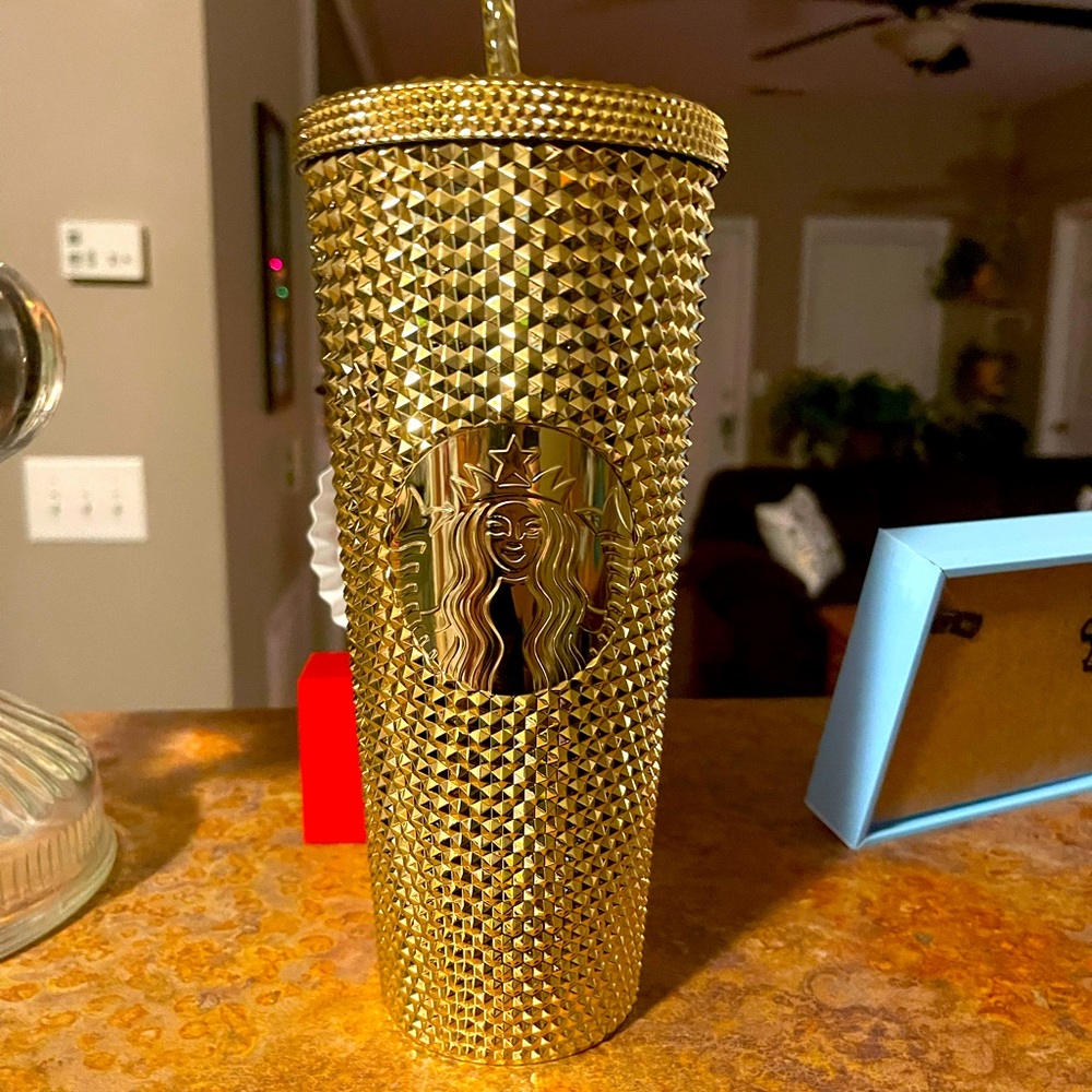 Gold studded Starbucks tumbler